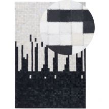 Beliani - Tapis Rectangulaire 160 x 230 cm en Peau de Vache Noir et Crème Moderne Pixel Bolu