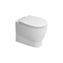 Vaso wc a terra filo parete scarico traslato in ceramica bianca serie demy vaso filoparete - scarico traslato - con sistema rimfree Ceramica Dolomite