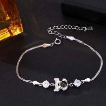 Foto Projektion Armband mit Bild im Stein - Hund und Knochenstab