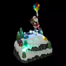 Scène de vie illuminée et animée (H22 cm) Envol du Père Noël