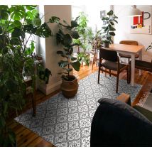 Tapis vinyle carreaux de ciment gris et fleurs