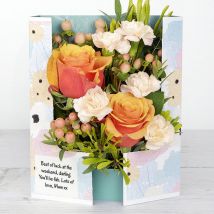 Flowercard with Downtown Roses, Spray Carnations, Hypericum Berries and Fresh Eucalyptus