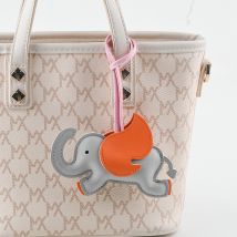 Porte-clés en cuir d'éléphant mascotte porte-clés créatif pour sac d'école porte-clés de voiture pendentif éléphant volant mignon en trois dimensions cadeau de Noël