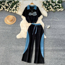 Vêtements pour femmes Costume de sport décontracté pour femmes en été Chic Mode rétro Revers Manches courtes Haut brodé Taille haute Pantalon large