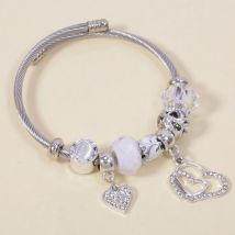 Bracelet de style couple avec pendentif en forme de couronne en cristal œil de chat en acier inoxydable