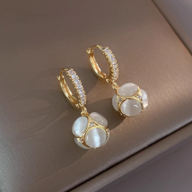 Boucles d'oreilles œil de chat pour femmes, boucles d'oreilles haut de gamme, boule, nouvelle collection 2023