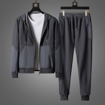 Vêtements pour hommes nouveaux costumes de loisirs de sport hommes en maille nid d'abeille élastique coupe ajustée à capuche mode costumes deux pièces