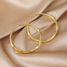 1 paire de boucles d'oreilles créoles rondes en alliage plaqué or de style décontracté et moderne
