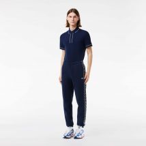 Lacoste - Pantalon de survêtement Jogger à bandes siglées - Couleur : Bleu Nuit