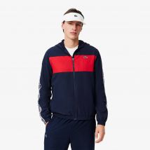 Lacoste - Veste Tennis color-block bandes griffées - Couleur : Bleu Marine / Rouge
