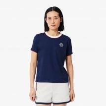 Lacoste - Short Tennis Héritage en Piqué stretch - Couleur : Blanc / Bleu Marine