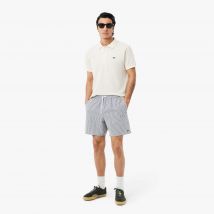 Lacoste - Short de bain mi-long rayé texturé - Couleur : Blanc / Bleu