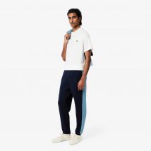Lacoste - Pantalon de survêtement fuselé color-block - Couleur : Bleu Marine / Bleu / Bleu Clair