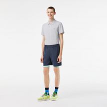 Short bicolore homme Lacoste Sport avec cycliste intégré - Couleur : Bleu / Vert Clair