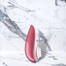 Roze Kunststof Liberty vibrator van Womanizer
