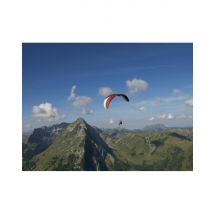 Wonderbox Vol en parapente au-dessus de Gruyères - Idée cadeau Offrez-vous un moment d'adrénaline incroyable lors d'un vol baptême en parapente . Vous