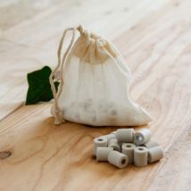 Perles de céramique purifiantes avec son sachet à thé en coton...