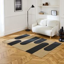 Beige interior/exterior carpet with black geometric pattern,