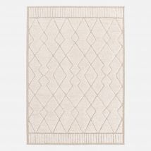 Interior rug with berber pattern, beige and cream,