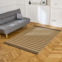 Beige interior/exterior rug with black stripes,