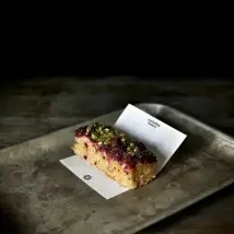 Sour Cherry &amp; Pistachio Cake - single slice