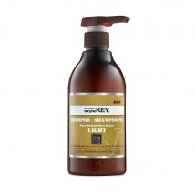 Saryna Key Damage Repair Champú reparador Light de Manteca de karité pura africana 500 ml - Easypara