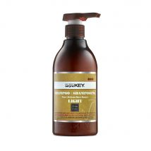 Saryna Key Damage Repair Champú reparador Light de Manteca de karité pura africana 300 ml - Easypara