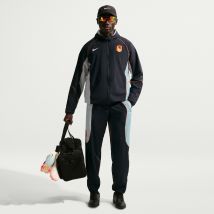 Nike - Pantalon survêtement Chelsea woven noir orange