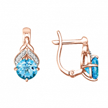 Ohrringe aus 585er Rotgold, mit blauen Topasen ≈ 6 mm und Zirkonia