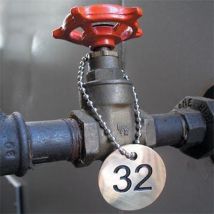Round brass valve tags. Dia. 27mm numbers 51 to 75. Per set
