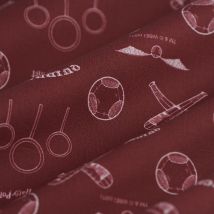 Tissu cretonne Quidditch Harry Potter rouge bordeaux - Mondial Tissus