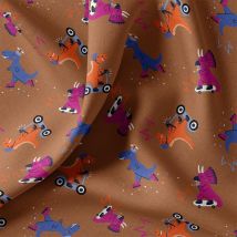Tissu cretonne imprimé dino skateur marron - DOMOTEX - Mondial Tissus