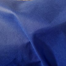 Intissé spun déperlant et résistant aspect tissu uni bleu roi 160cm - Mondial Tissus