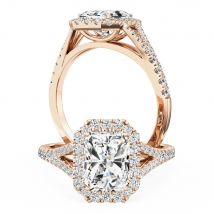 A stunning radiant cut diamond ring with shoulder stones in 18ct rose gold