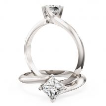 A stylish princess cut solitaire twist diamond ring in 18ct white gold