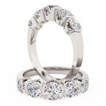 A striking round brilliant cut five stone diamond ring in 18ct white gold